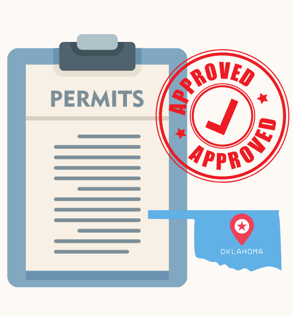 Clipboard with a generic permit document on it. Red approved stamp and state of Oklahoma graphic beside clipboard.